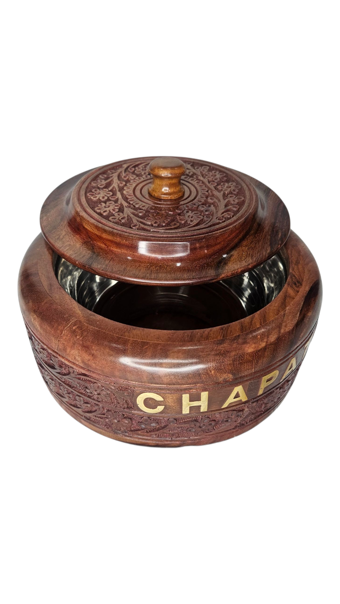 Close-up of floral brass work on chapati box exterior